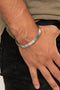 Mind Games - Silver Cuff Bracelet-Paparazzi Accessories